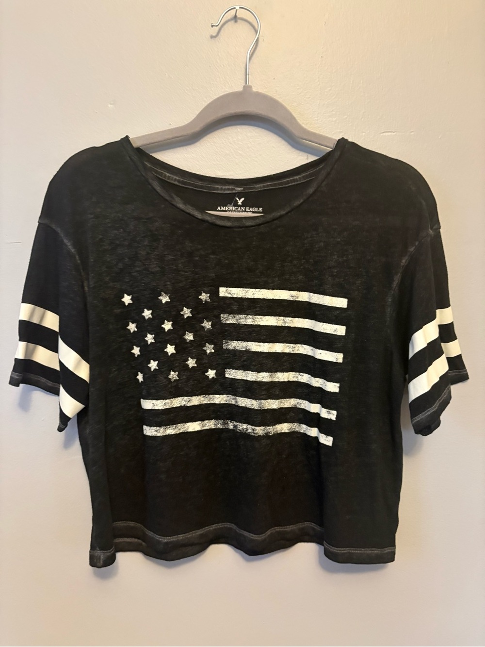 American Eagle Outfitters Black Cropped Tee with White Flag Graphic